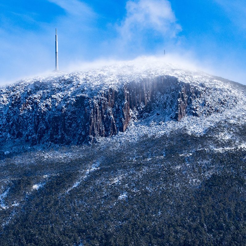 A cold mount wellington in Hobart Tasmania with snow on it suggesting its time to heat your house.